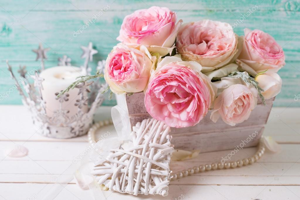 pink roses flowers  in wooden box