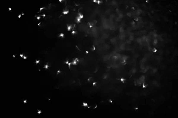 Siyah ve beyaz bokeh daireleri bir tasarım elementi, kaplama ya da arka plan ışığı olarak