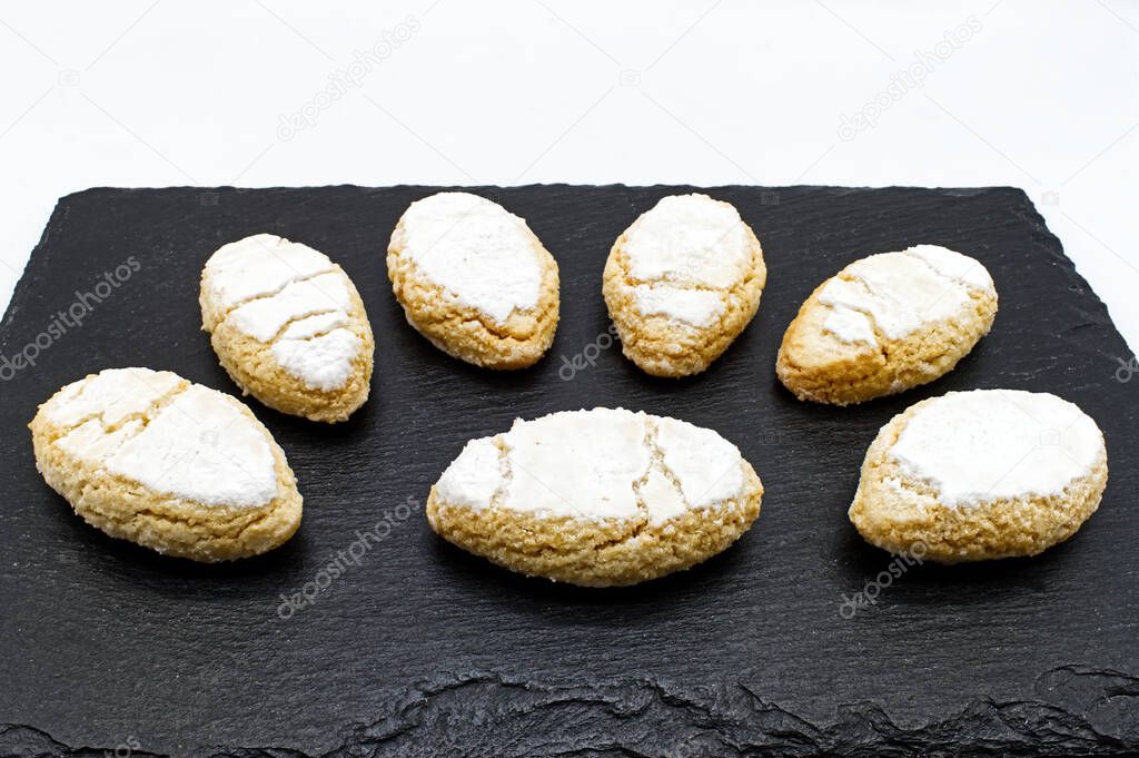 Ricciarelli, almond cookies originating from Siena, Tuscany, Italy. Ricciarelli senesi are traditional Christmas marzipan cookies, made with almonds, sugar, egg whites.