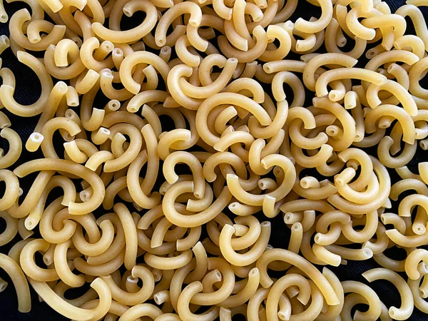 Raw Gramigna Pasta Dark Background Top View — Stock Photo, Image