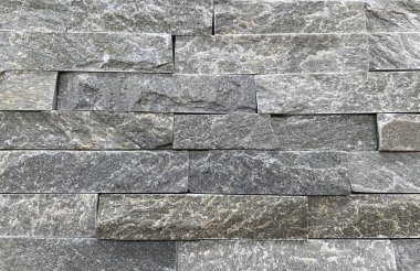 Mermer duvar arka planı. Döşeme ve arkaplan olarak mermer tuğla duvar.