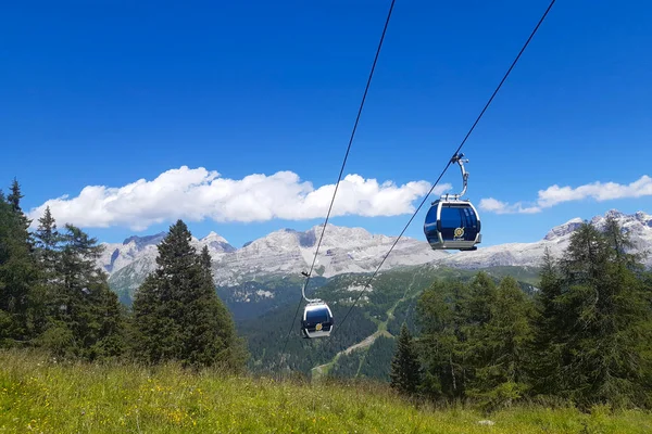 Cable car and panoramic view of the mountains from the path that leads to the 5 lakes refuge and Ritorto lake in Trentino, Adamello - Brenta Park in the Dolomites, travel and landscapes in Italy