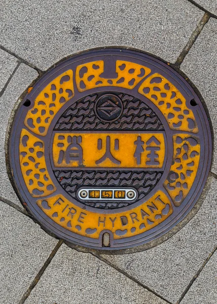 Fire hydrant on a footpath at Yokohama Chinatown — Stock Photo, Image