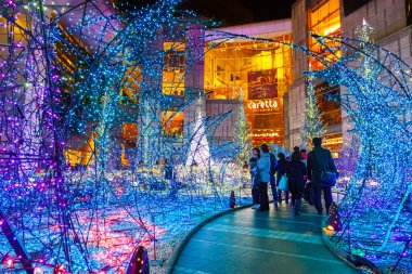  Illuminations light up at at Caretta shopping mall in Shiodome district, Odaiba area clipart