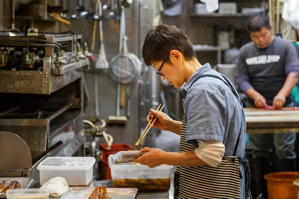 Japanese shop keeper — Stock Photo, Image