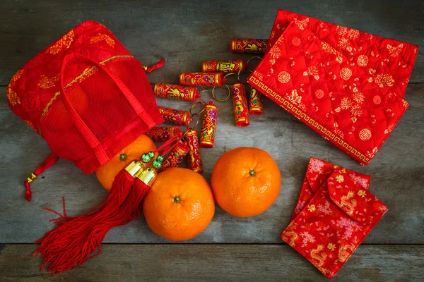 Oranges with Red Lucky Pouches and Firecracker Prepared for a Ch — Stock Photo, Image