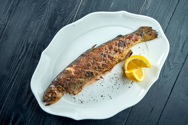 Whole Grilled Trout Charcoal Fire Served White Plate Lemon Dark — Stock Photo, Image