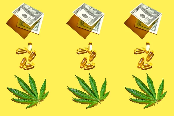 大麻の葉を持つパターン 100ドル札 ハードライトと黄色の背景に黄色の透明な丸薬やオメガビタミン — ストック写真