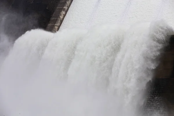 Water falling from the spillway of the concrete dam, it is overflow way of over-water in rainy season.