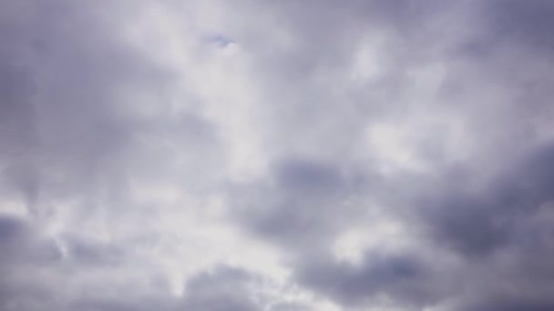 Timelapse shot of beautiful rain clouds overtaking the sky. Dramatic atmospheric video of an impending thunderstorm — Stock Video