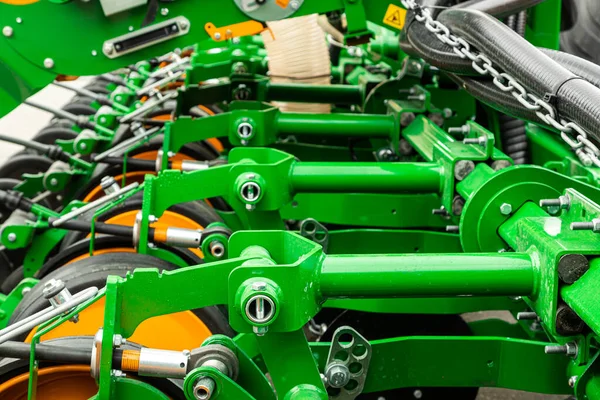 Agricultural machinery. Close-up of technical units and mechanisms of agricultural machinery. Springs and suspension elements