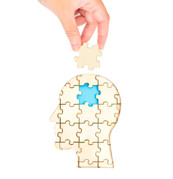 Female Hand Placing Missing Brain Piece Jigsaw Puzzle Forming Human — Stock Photo, Image