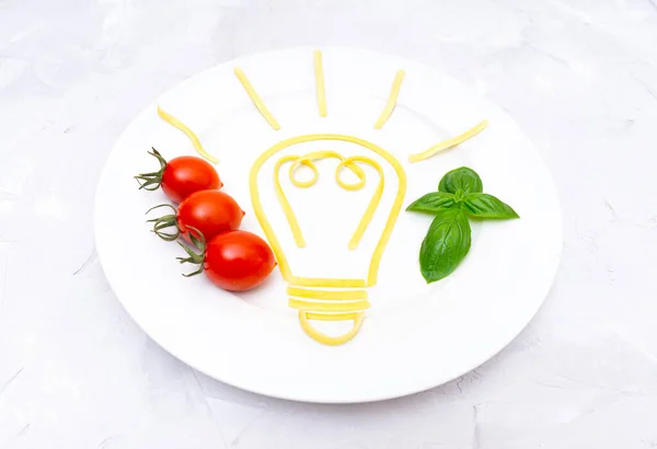 White Plate Glowing Light Bulb Symbol Made Boiled Pasta Cherry — Stock Photo, Image