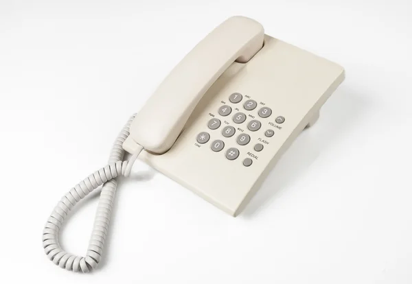 Бежевый стационарный телефон — стоковое фото