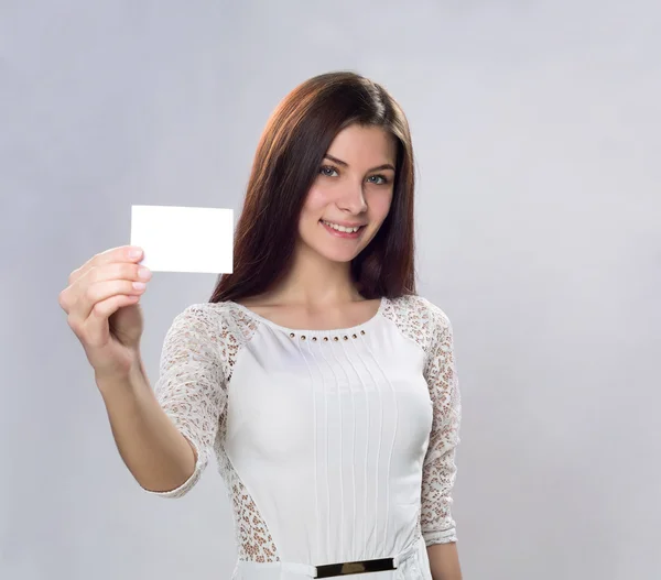 Young business woman with empty busineess card — Stock Photo, Image