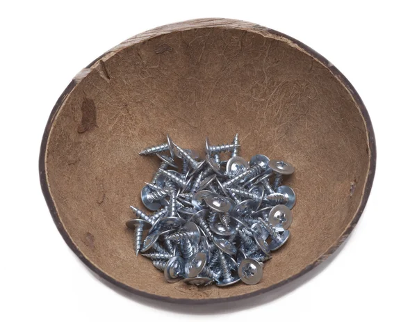 Round box of screws on white background — Stock Photo, Image