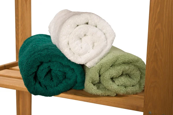 Stack of twisted terry towels on a shelf — Stock Photo, Image