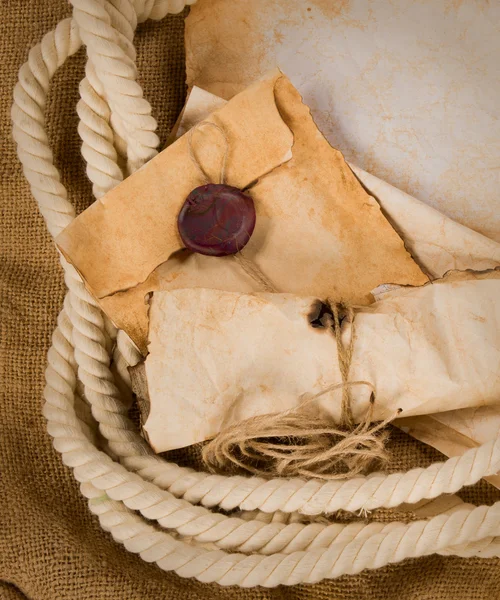 Old envelope, parchment and rope — Stock Photo, Image