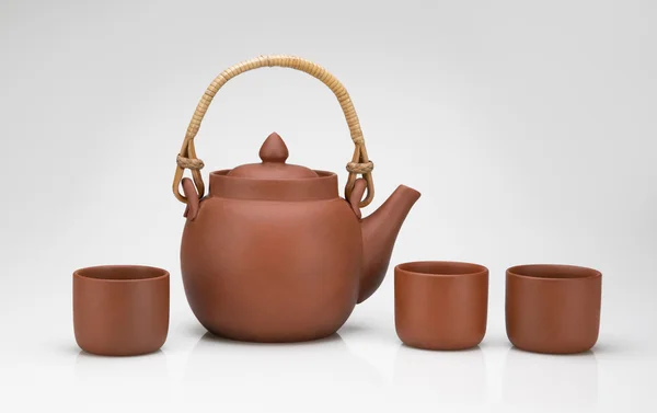 Clay teapot with three cups — Stock Photo, Image