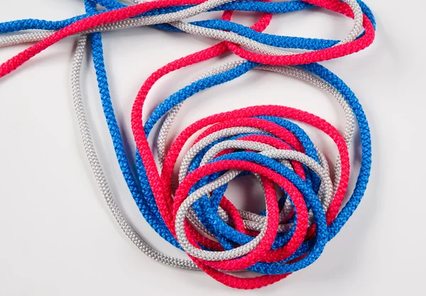 Three colorful twisted sewing strings — Stock Photo, Image