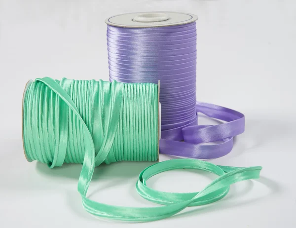 Purple and green ribbon coils — Stock Photo, Image