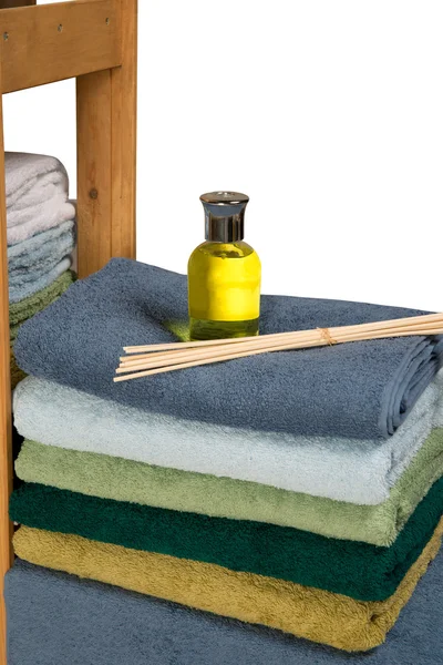 Terry towels with yellow liquid — Stock Photo, Image