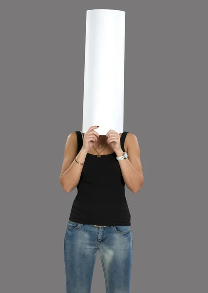 Woman hiding behind paper — Stock Photo, Image