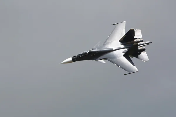 Millitary supersonic fighter, on the gray sky — Stock Photo, Image
