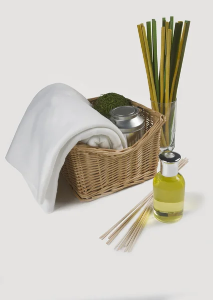 Towel in basket isolated on white background — Stock Photo, Image
