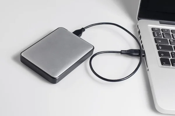 Hard drive connected to the computer — Stock Photo, Image