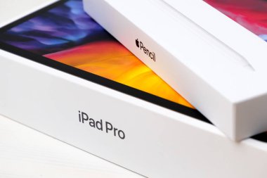 iPadPro and Apple pencil boxes isolated on the white background, December 2020, San Francisco, USA.