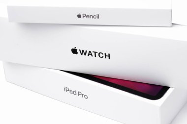 Apple pencil, watch, iPad pro boxes on the white background, December 2020, San Francisco, USA