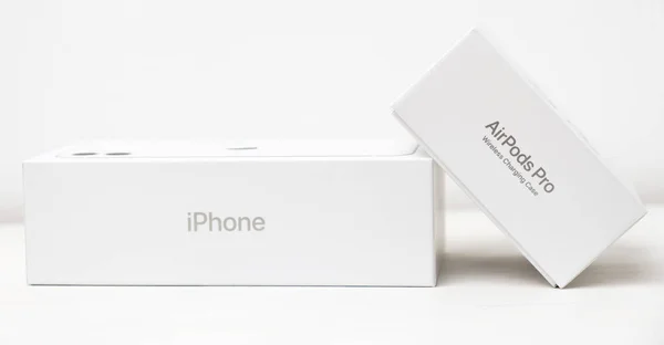 IPhone and AirPods Pro boxes isolated on the white background. Unboxing process. Shopping concept. December 2020, San Francisco, USA — Foto Stock