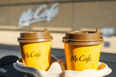 Coffee from Mc Cafe in the car, March 2021, Prague, Czech Republic.  clipart