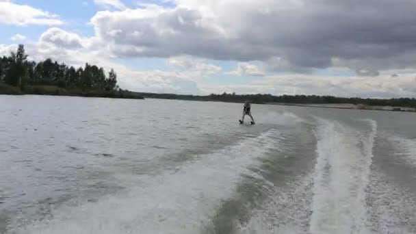 Man on water ski in cloudy day — Stock Video