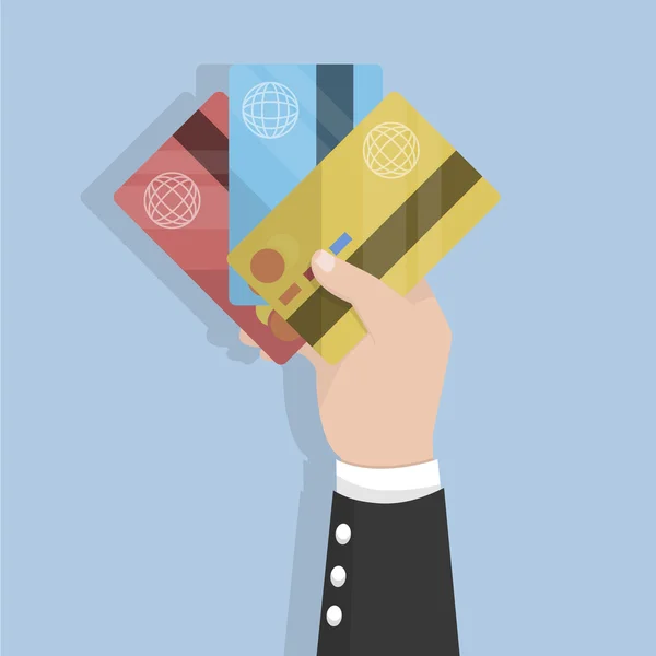 Biznesmen posiadający trzy karty kredytowe w ręku — Wektor stockowy