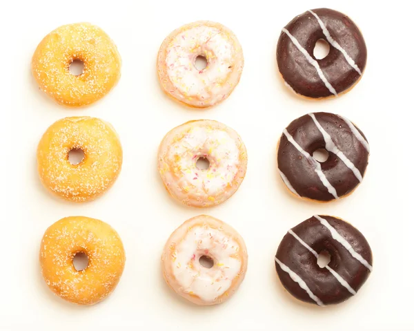 Variety of donuts, high angle view from above — Stock Photo, Image