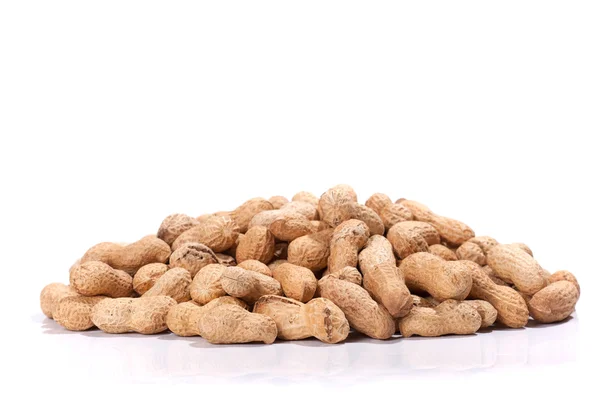 Heap of peanuts on white background — Stock Photo, Image