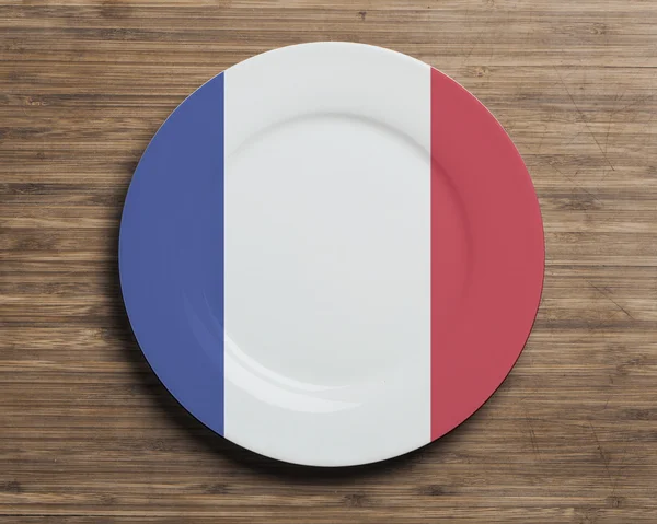 Placa na mesa com bandeira da França — Fotografia de Stock