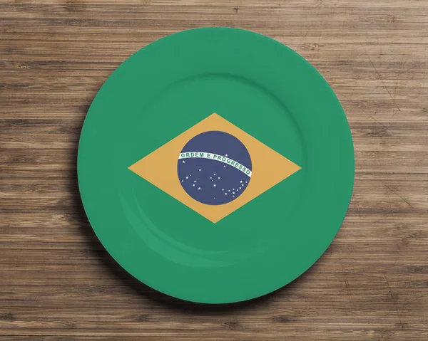 Placa na mesa com bandeira do Brasil — Fotografia de Stock