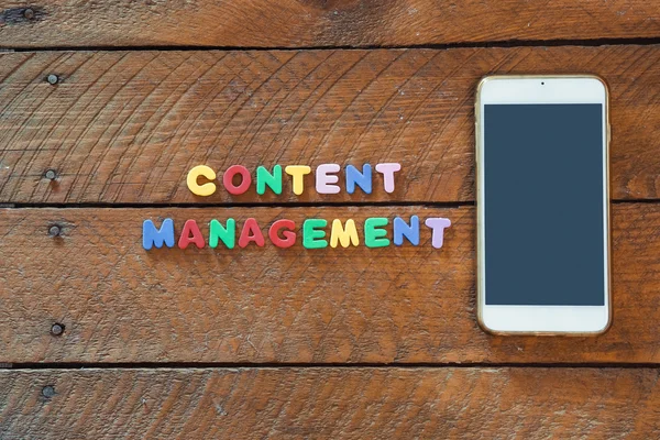 Content Management concept with smart phone — Stock Photo, Image