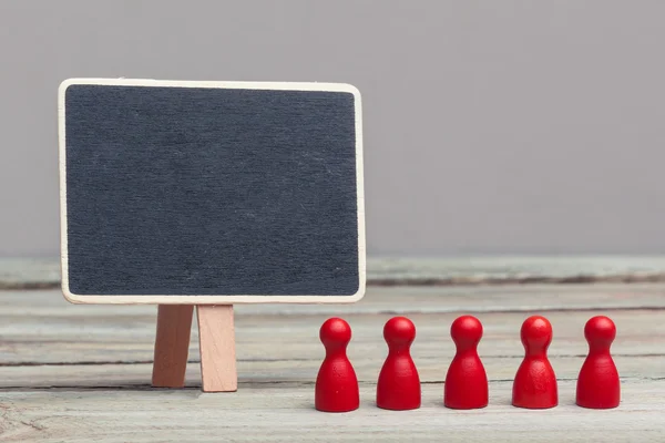 Teamwork concept, red board pieces with copy space chalkboard — Stock Photo, Image