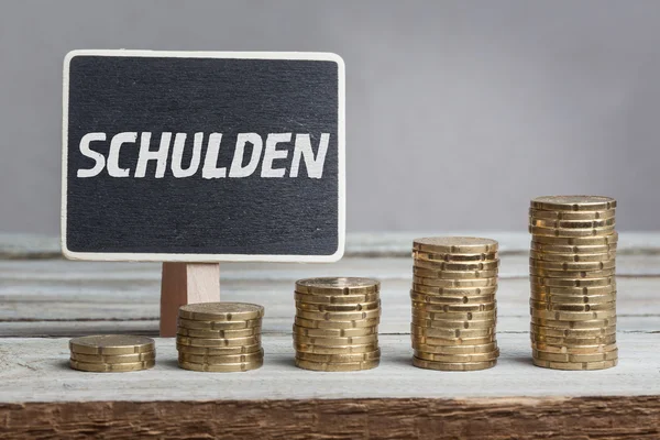Schulden (tartozás) német nyelven — Stock Fotó