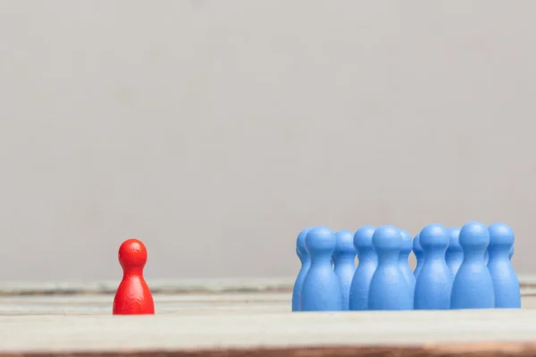 Red against blue concept, crowd of pawns — Stock Photo, Image