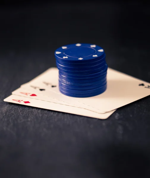 Four aces and stack of poker chips — Stock Photo, Image