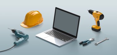 dizüstü bilgisayar, kask, matkap ve inşaat araçları