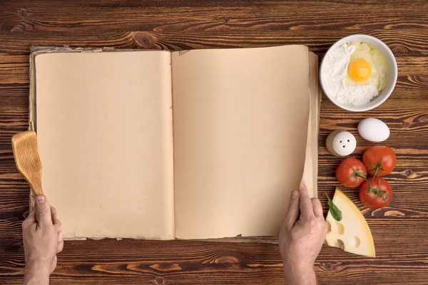 Hand chef, cook book, ingredients — Stock Photo, Image