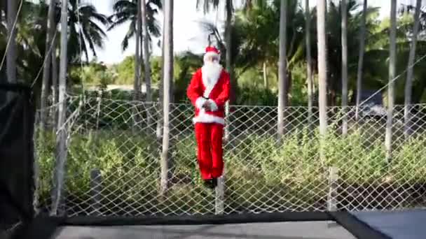 Santa Jumping Trampoline Boy Santa Clause Suit Makes Blanche Jump — Stock Video