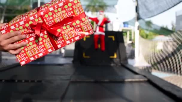 Santa Jumping Trampoline Bag Gifts Gift Box Boy Santa Clause — Stock Video