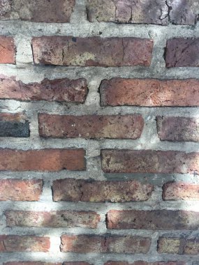 Açığa çıkmış tuğla bir duvara yakın çekim